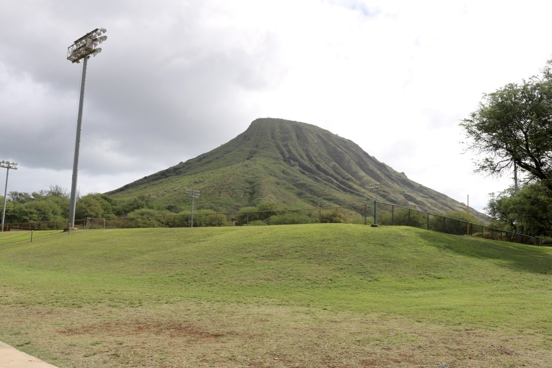 Green ridges of Koko Crater rising above the grassy park below